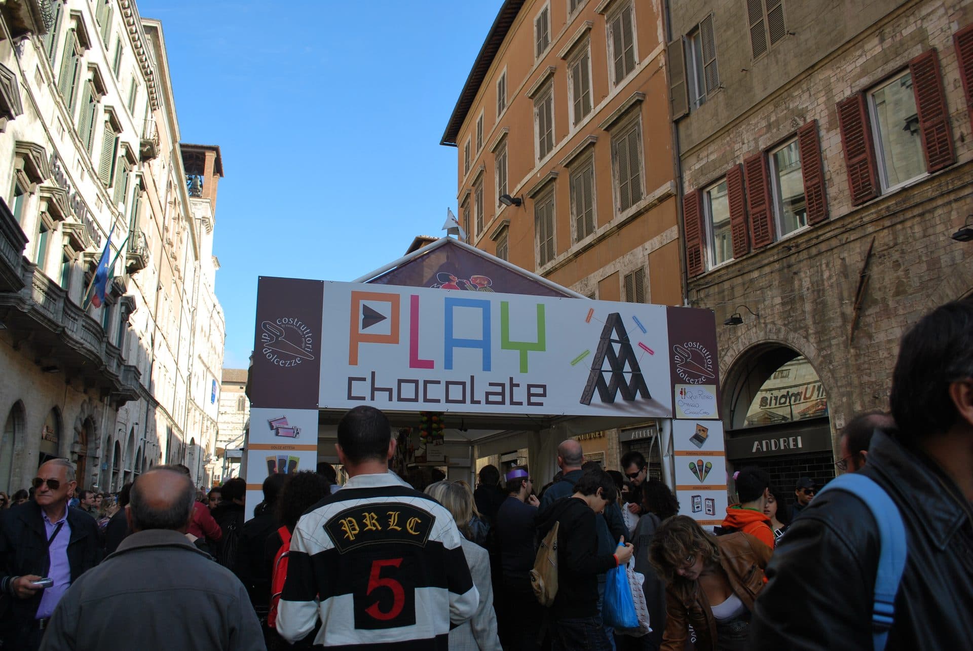 Crowds around a chocolate stall in Perugia's old town during Eurochocolate