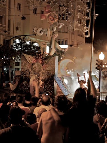 Smoke and flames rise from a burning monument as crowds watch the cremà in Alicante on St John's night
