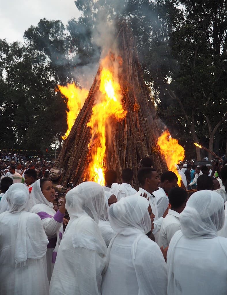Worshippers dressed in white surround the blazing demera bonfire on the eve of Meskel in Ethiopia