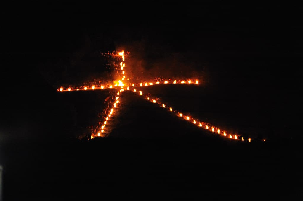 The Daimonji bonfire burning on the hillside above Kyoto at the end of Obon