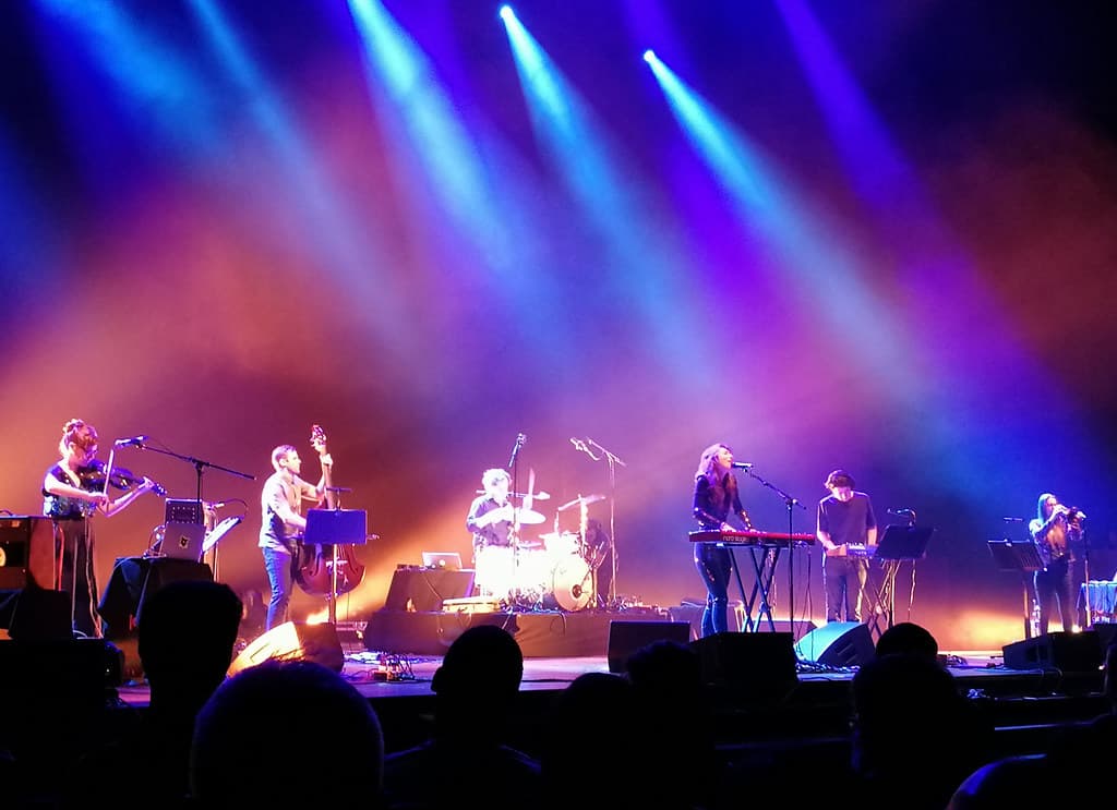 A band performs on a stage bathed in blue and purple light at Primavera Sound in Barcelona