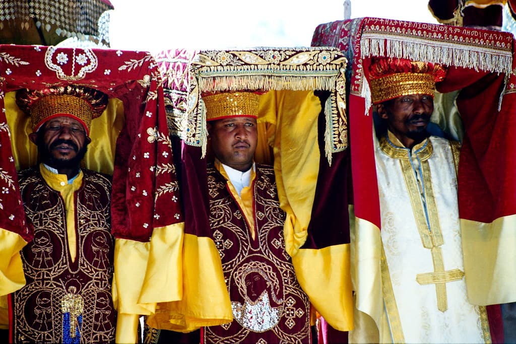 Priests in embroidered robes carrying the tabot during Timkat in Ethiopia