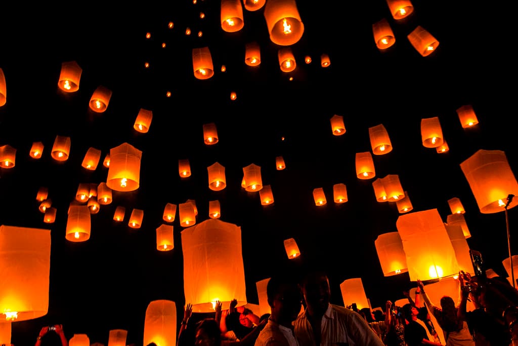 Thousands of glowing lanterns released into the night sky for Waisak