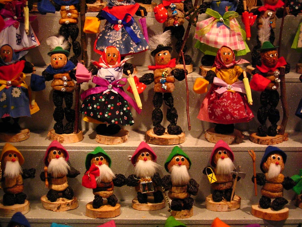 Rows of small figures made from dried prunes, the Zwetschgenmännle, on a Nuremberg market stall